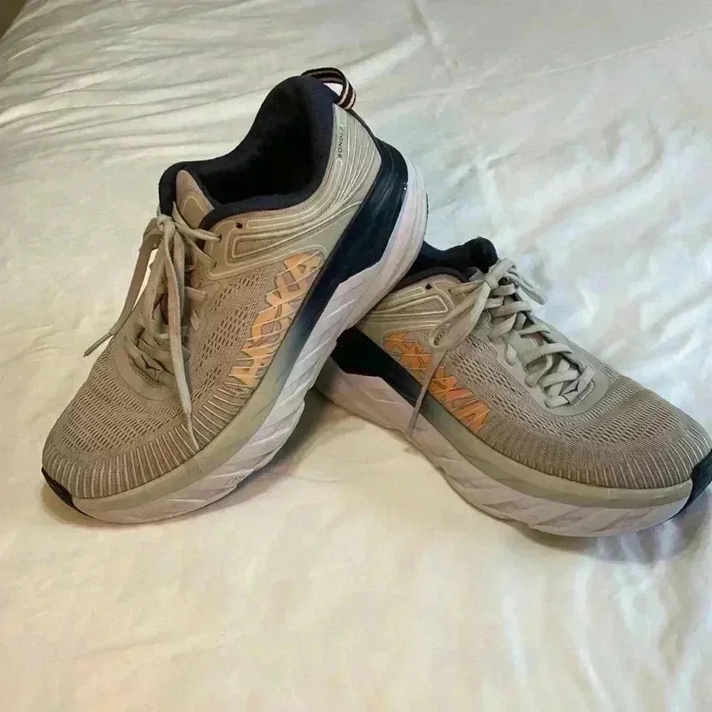 Hoka Bondi 7 Tennis Shoe Gray, Blue & Peach/Orange in Woman’s Size 9.